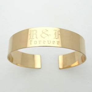 Wide engraved gold cuff