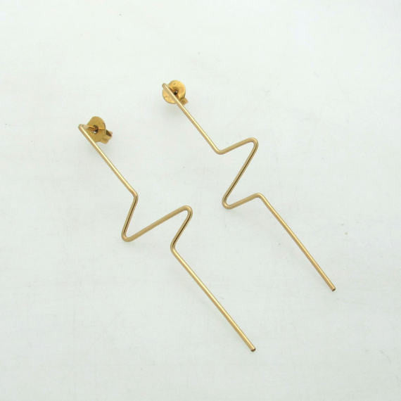 Long stick earrings in gold