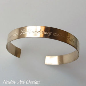 Gold cuff with engraving