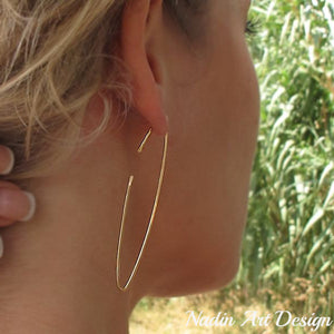 Long gold hoop earrings