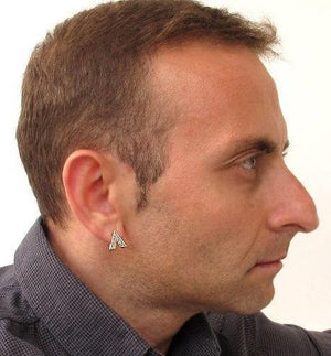 Tips for choosing men's earrings. Modern Men's Earrings. A meaningful accessory of all times