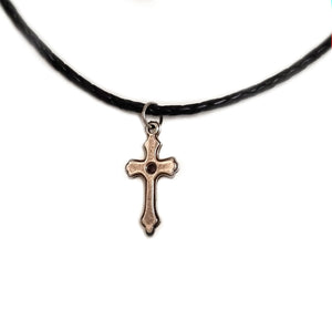 rustic cross pendant on the leather cord