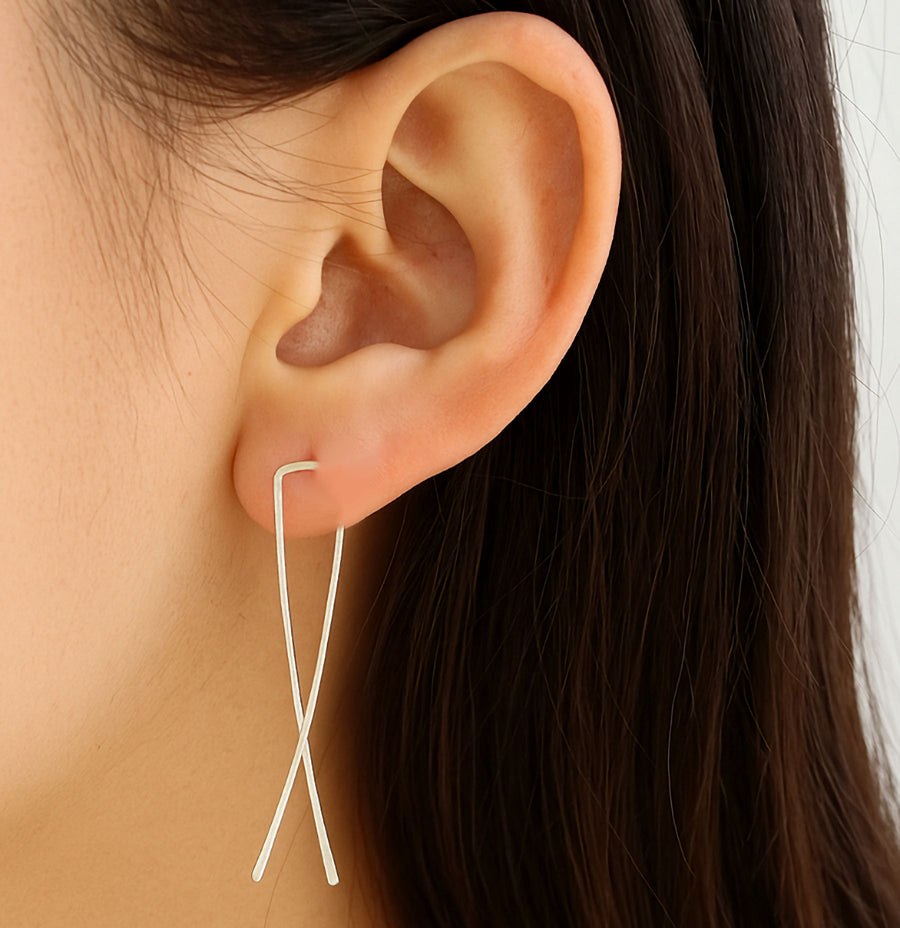 Ling bow crossover earrings in silver