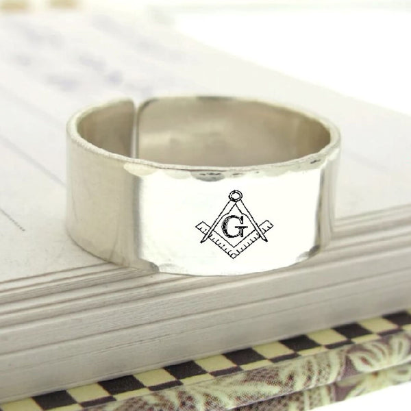 Silver ring with Masonic symbol 