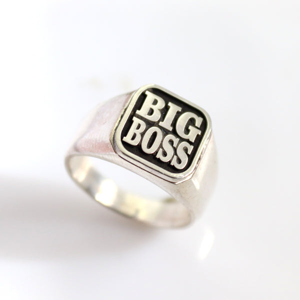 silver engraved black background signet