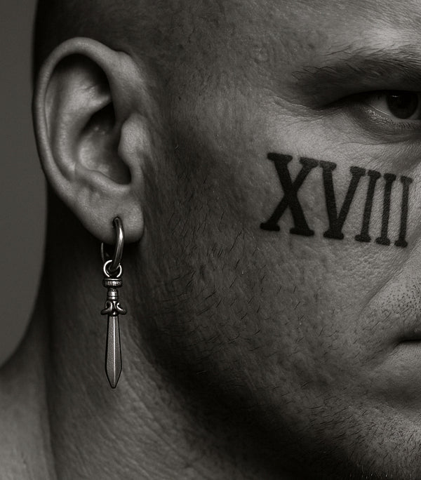 sword charm earring on mens ear