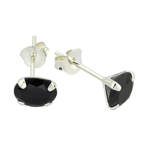 Silver stud earrings with black gemstones on a white background