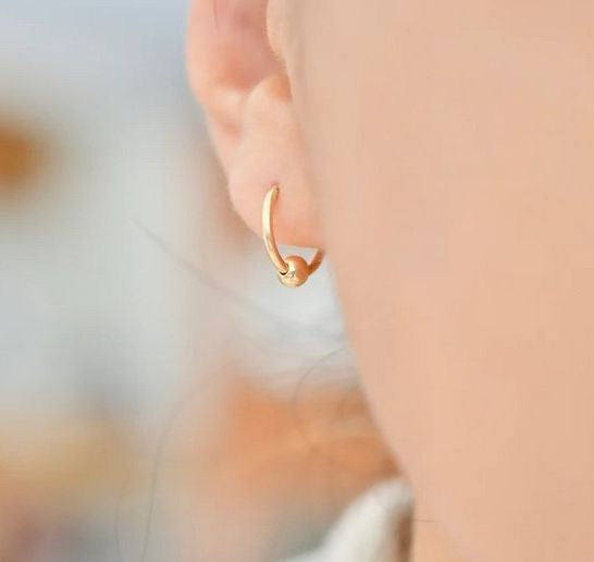 Small floating ball hoop earrings