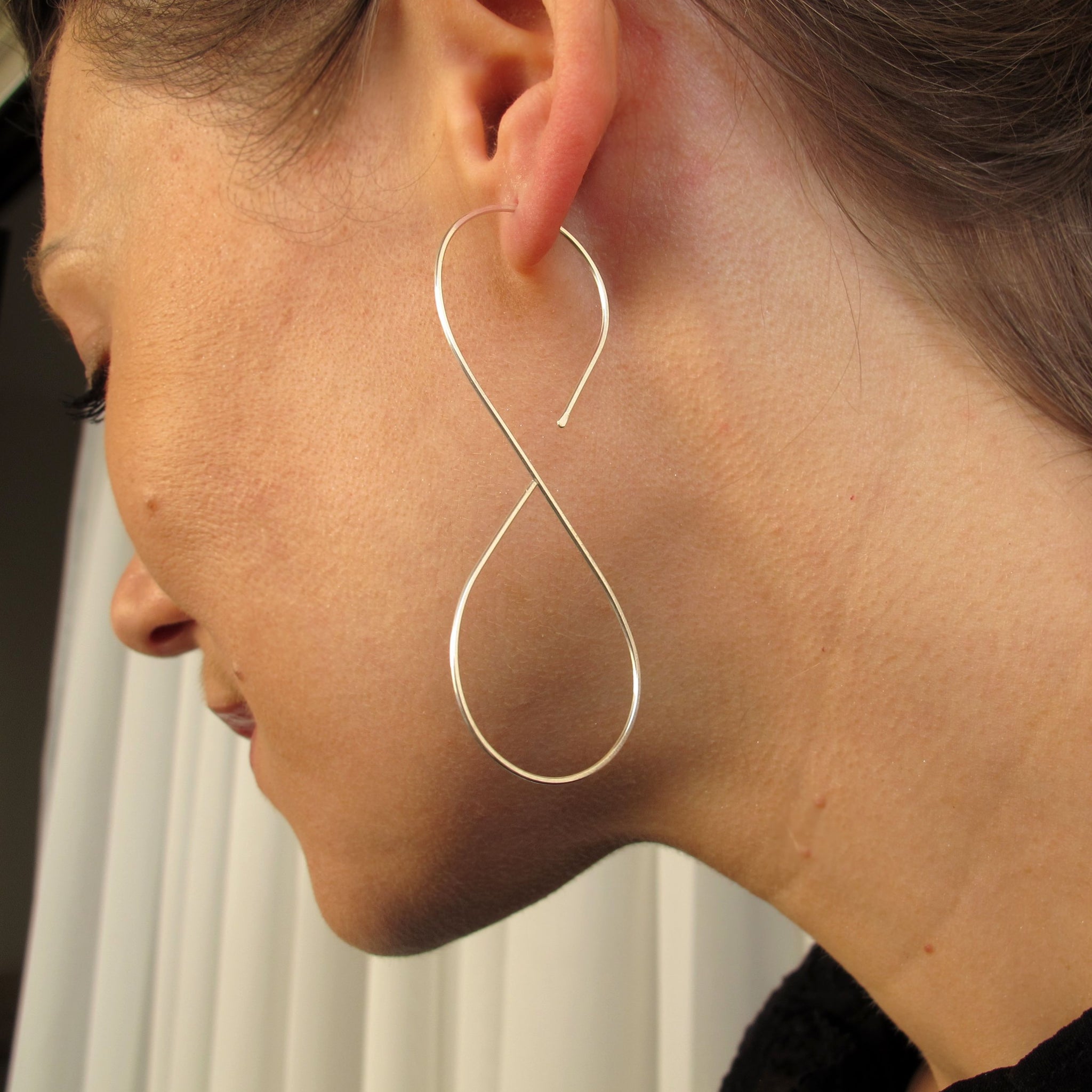 Infinity Hoop Earrings in Sterling Silver