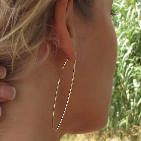 Long gold hoop earrings