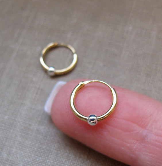 Small floating ball hoop earrings