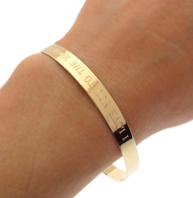 Gold bangle bracelet with engraving