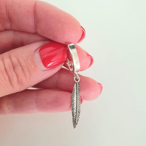 artisan feather dangle silver earring