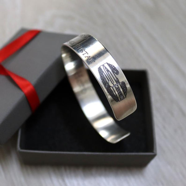 combat action badge engraved on bracelet