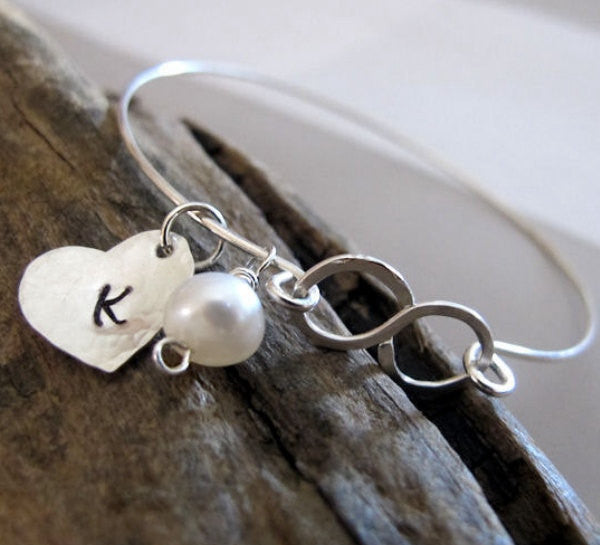 Heart and pearl charm bracelet with infinity symbol