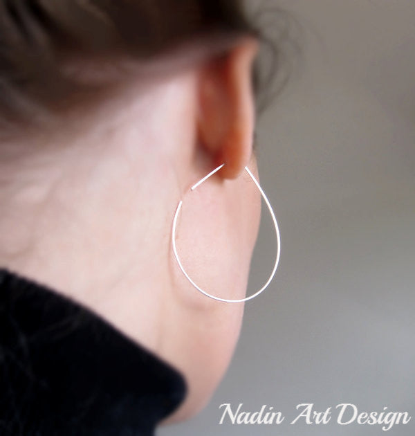 open_hoops_teardrop_shapped_earrings