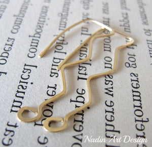 Gold long waves earrings