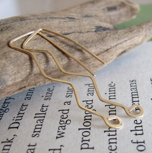 Gold long waves earrings