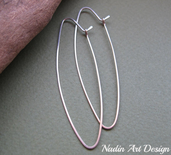 Long narrow silver hoops