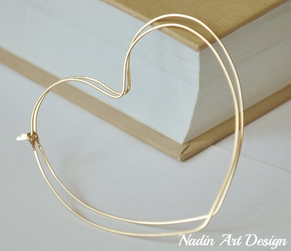 Big heart gold earrings