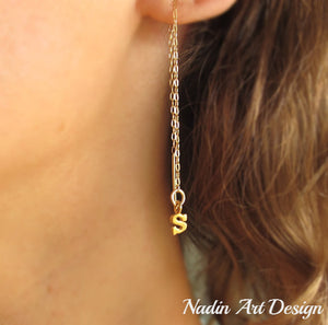 Long chain gold earrings with charms