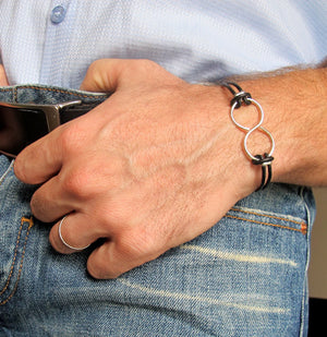 infinity leather bracelet in Sterling silver