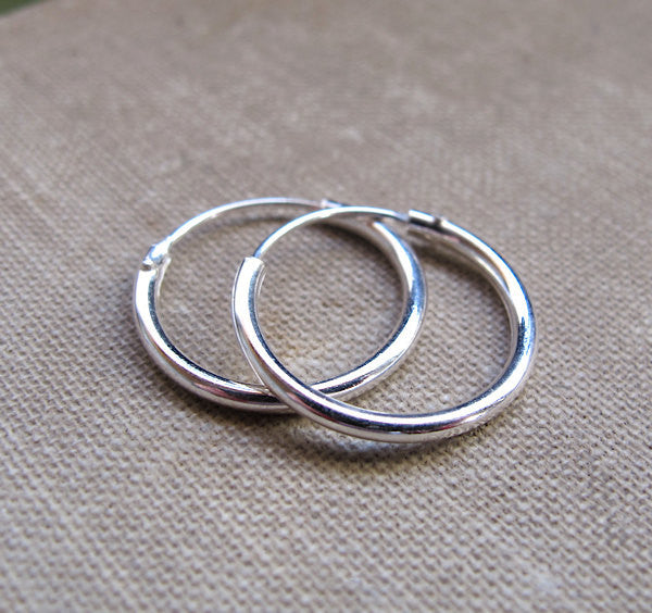 Small silver unisex hoops