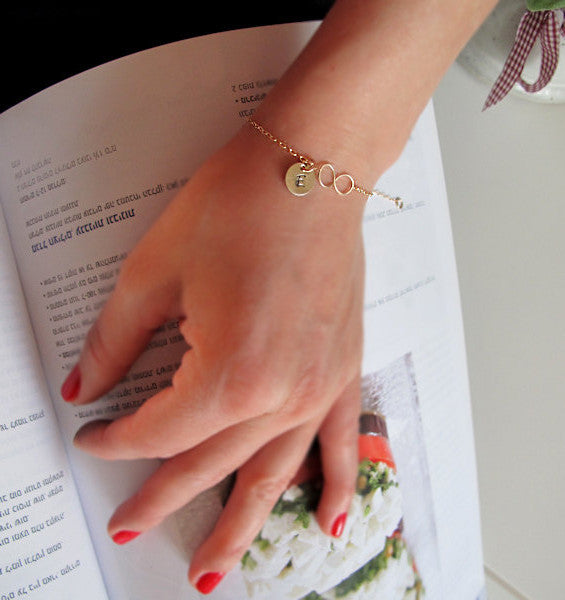 Gold charm infinity bracelet