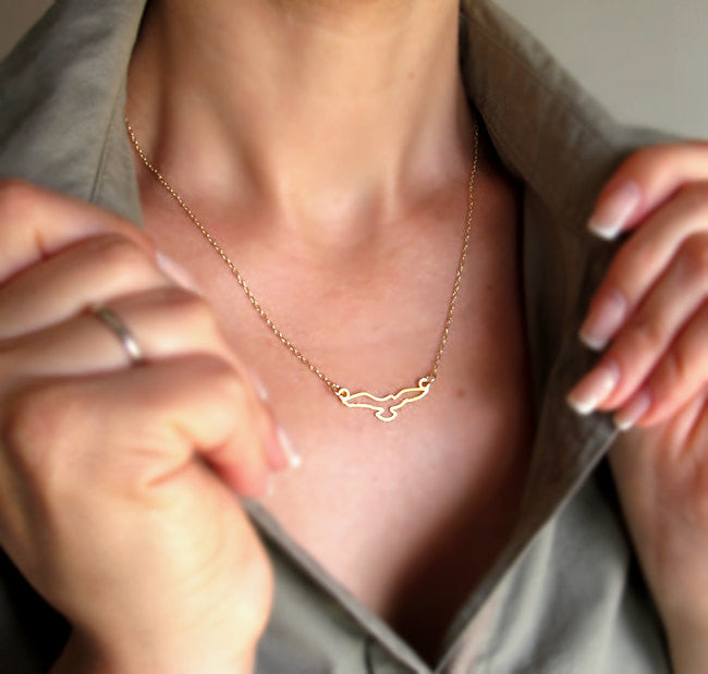 Bird pendant gold necklace