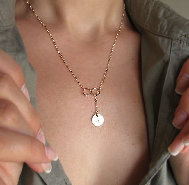 Infinity gold necklace with letter charm