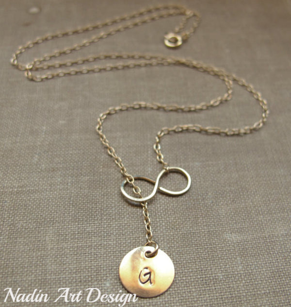 Infinity gold necklace with letter charm
