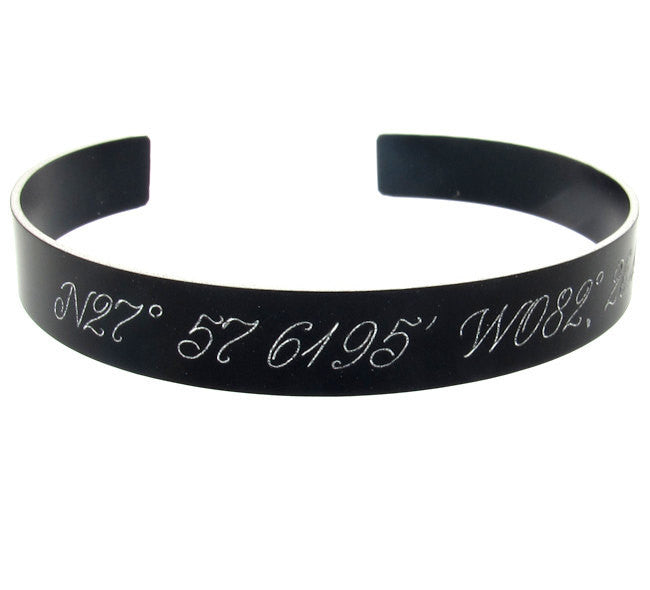 Black cuff with engraving