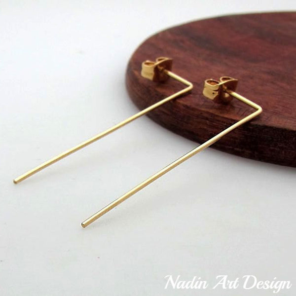 Thread long gold earrings