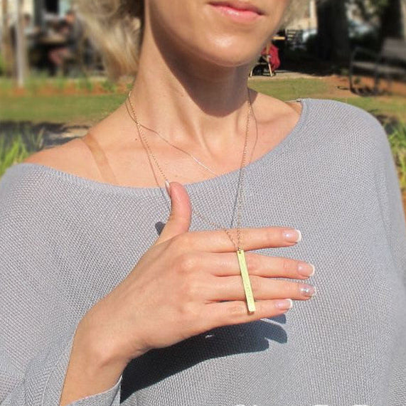 Long pendant gold necklace