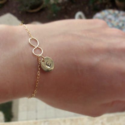 Gold charm infinity bracelet