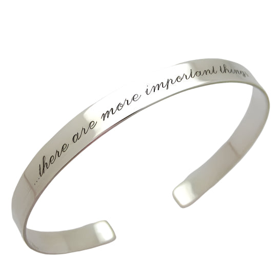 elegant silver cuff bracelet with the custom engraved message