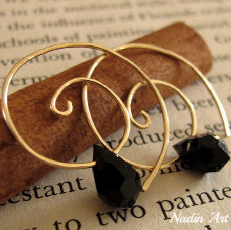 spiral gold hoops with black teardrop crystal